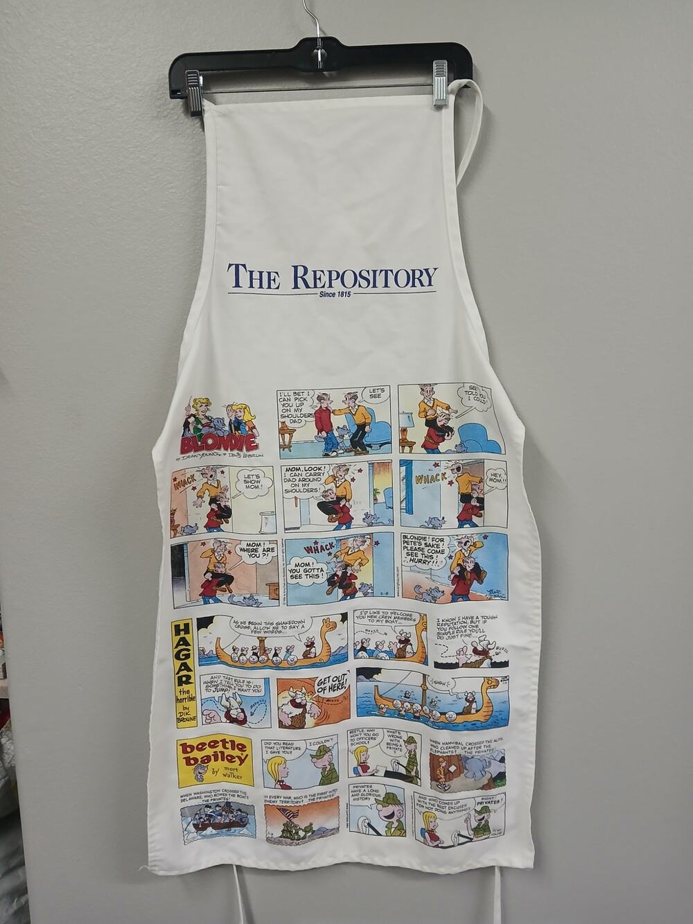 vintage promotional newspaper comic strip apron
